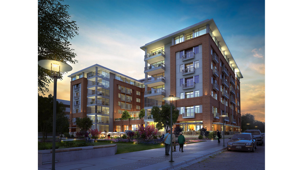 A street with cars and buildings along it.