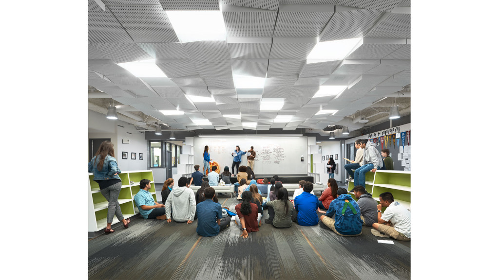 A group of people sitting in a room.