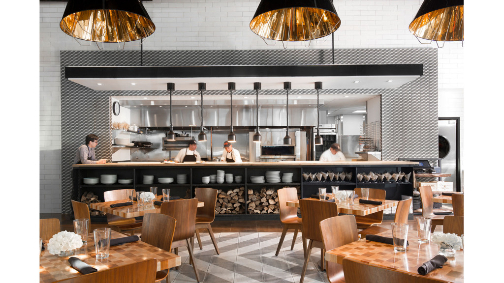 A restaurant with tables and chairs.