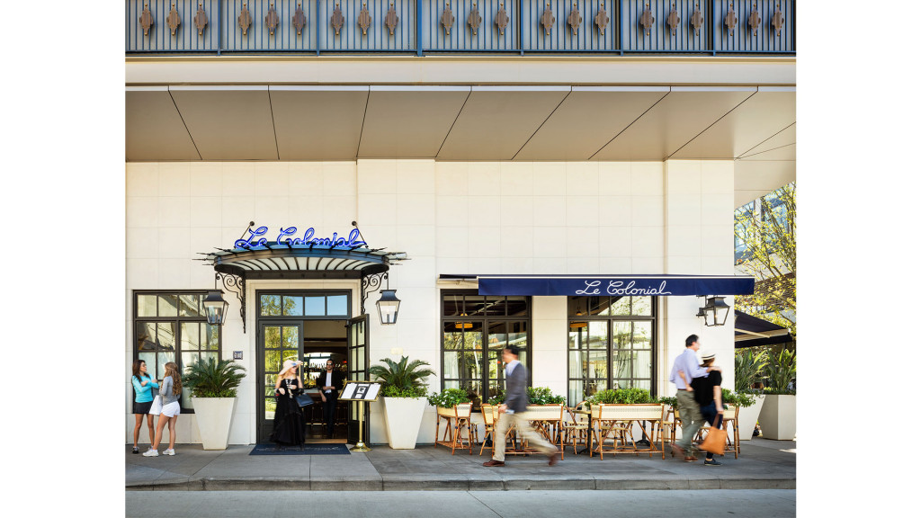 A group of people outside a building.