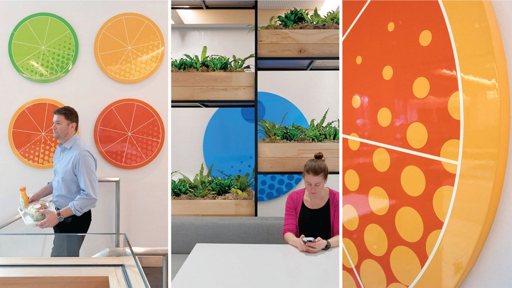 A man and a woman looking at a computer screen.