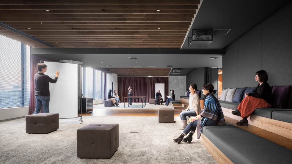 A group of people in a room.