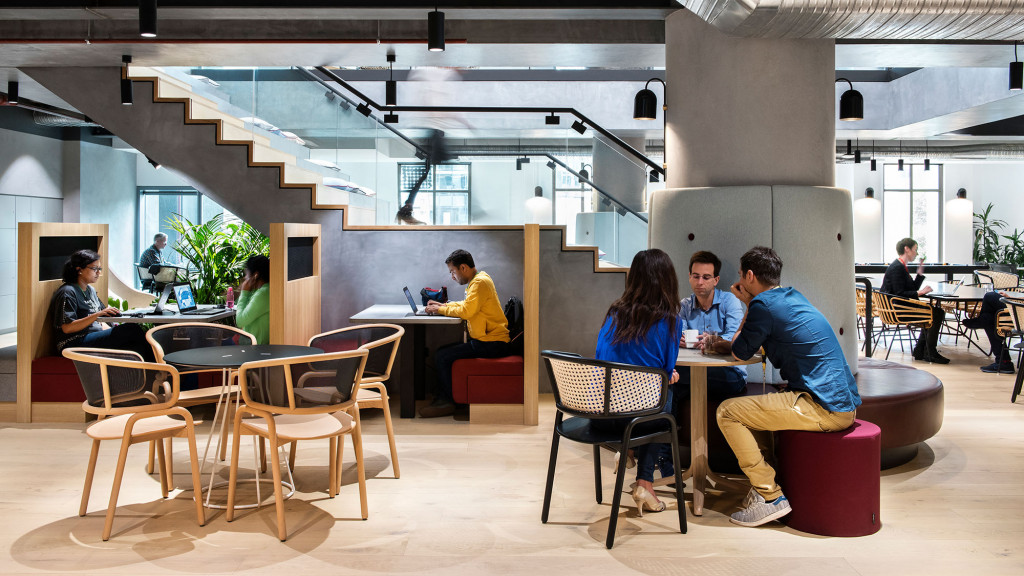 A group of people sitting around a table.