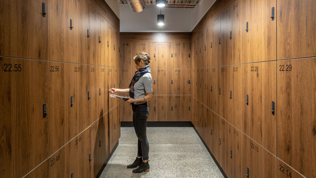A man standing in a hallway.