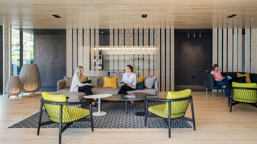 A group of people sitting on a couch.
