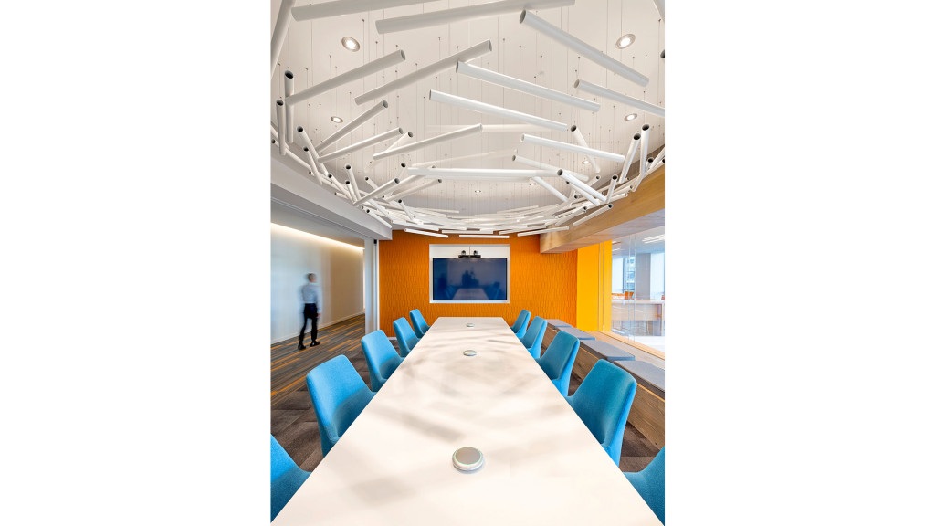 A person walking in a room.