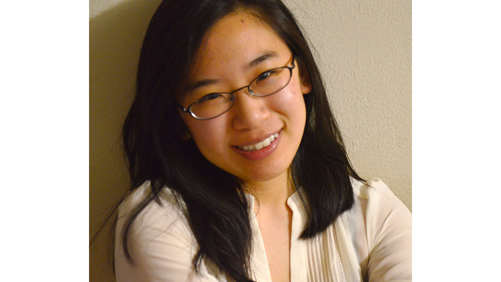 A woman wearing glasses.