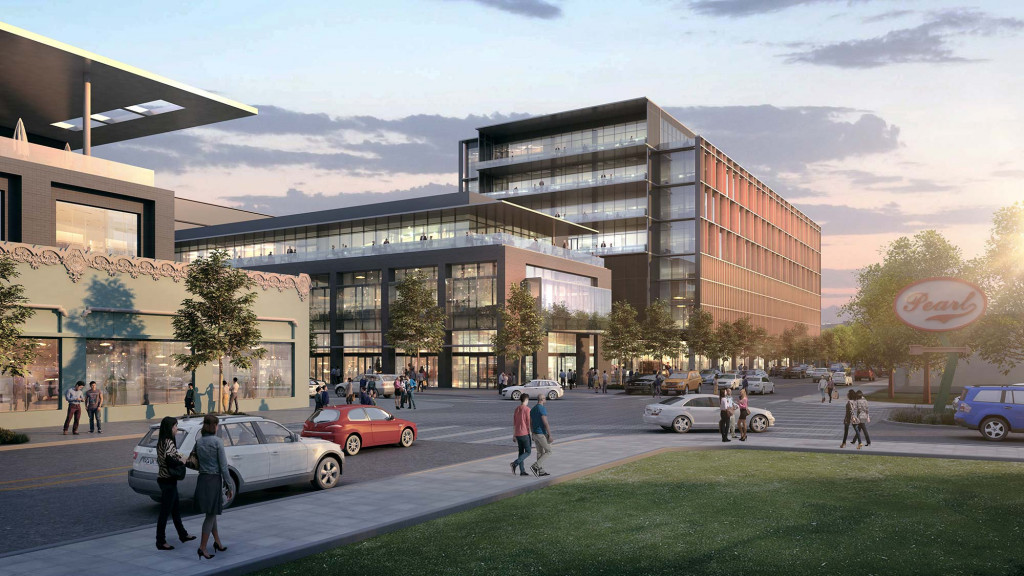 A group of people walking outside of a building.