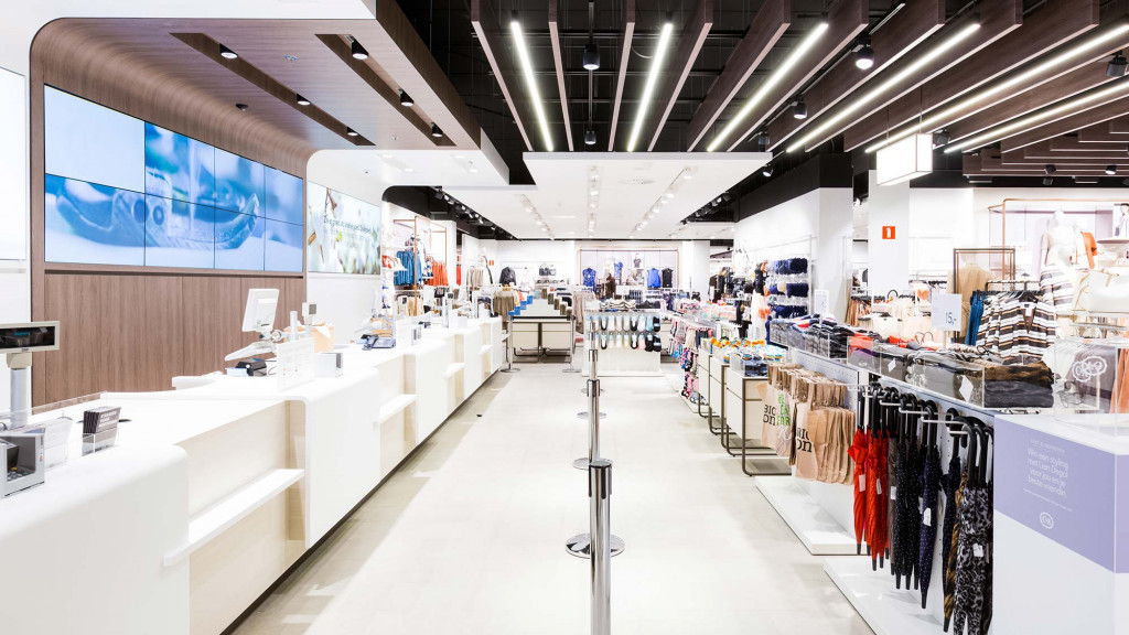 A store with a large display of clothes.