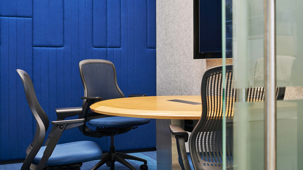 A table with chairs around it.