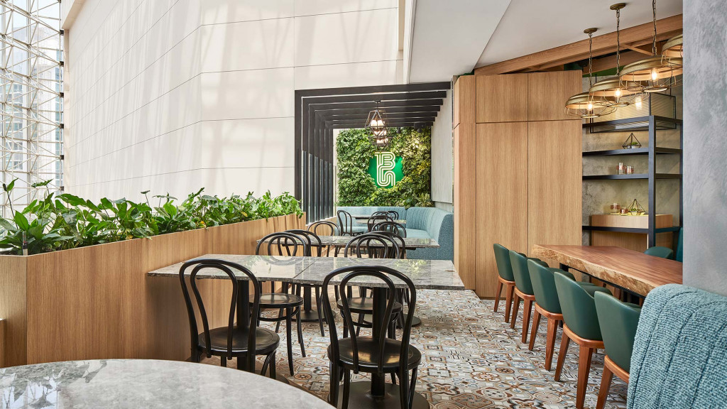 A room with tables and chairs.