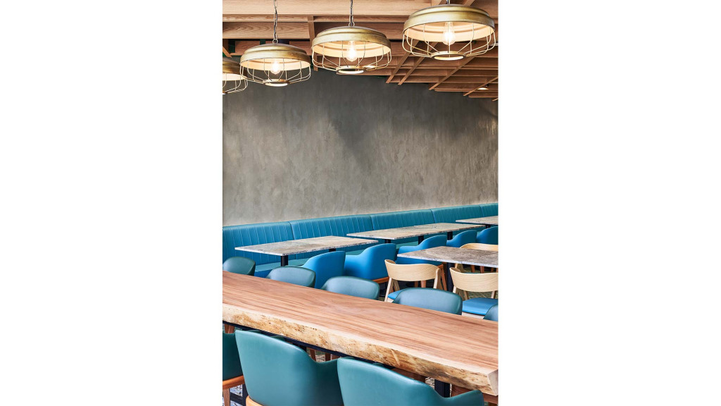 A room with blue chairs.