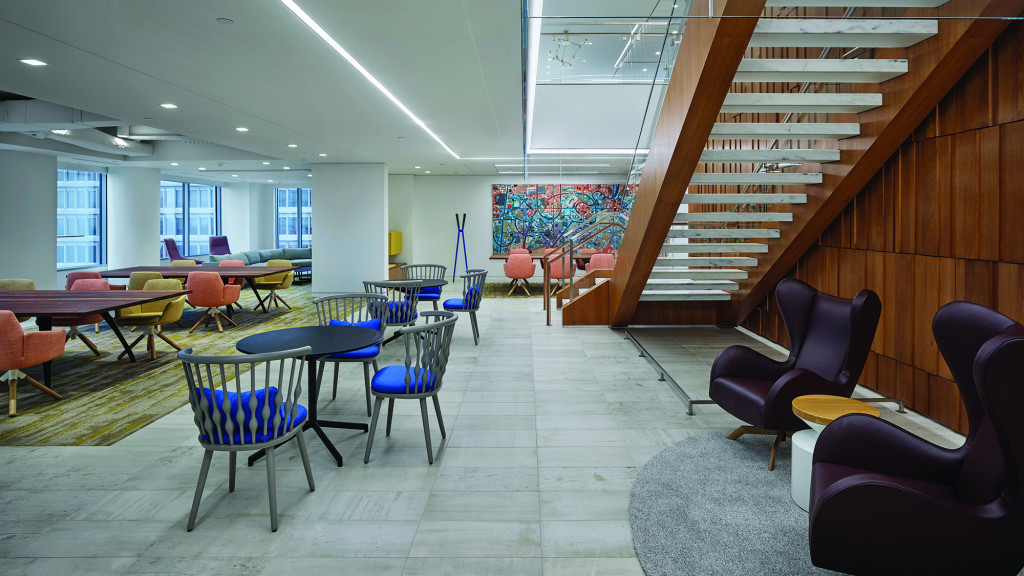 A room with tables and chairs.