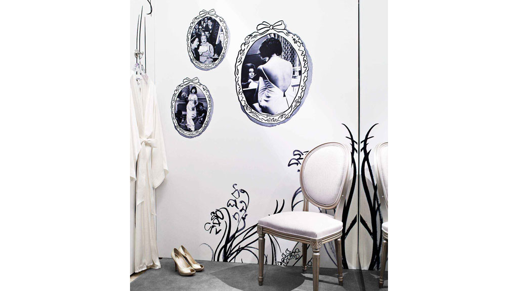 A room with a wall of plates.