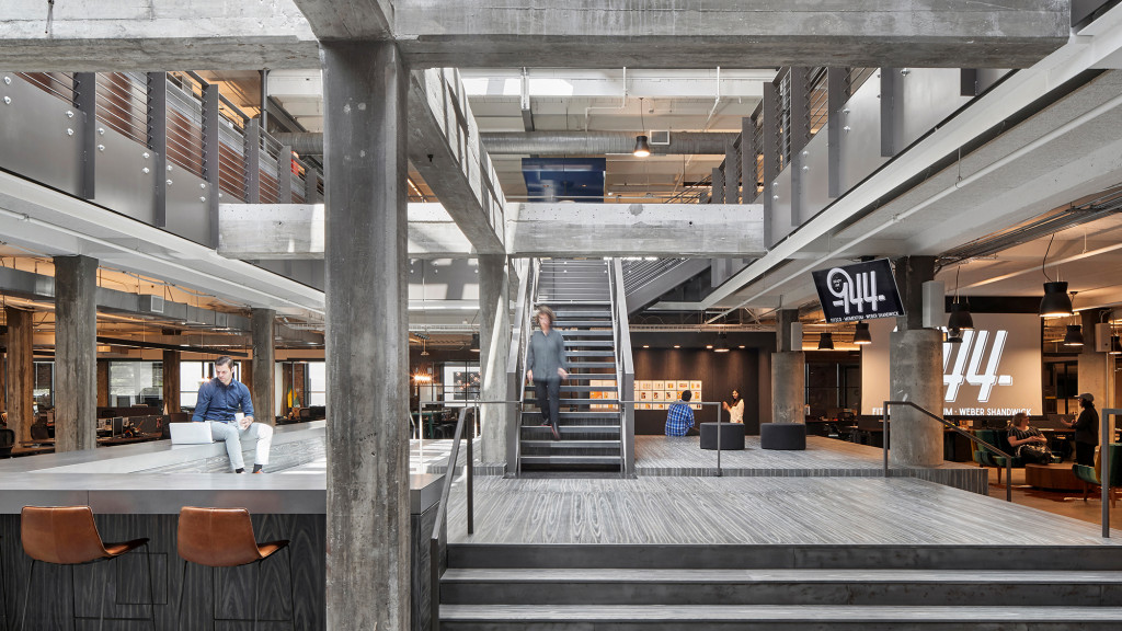 A few people in a building.