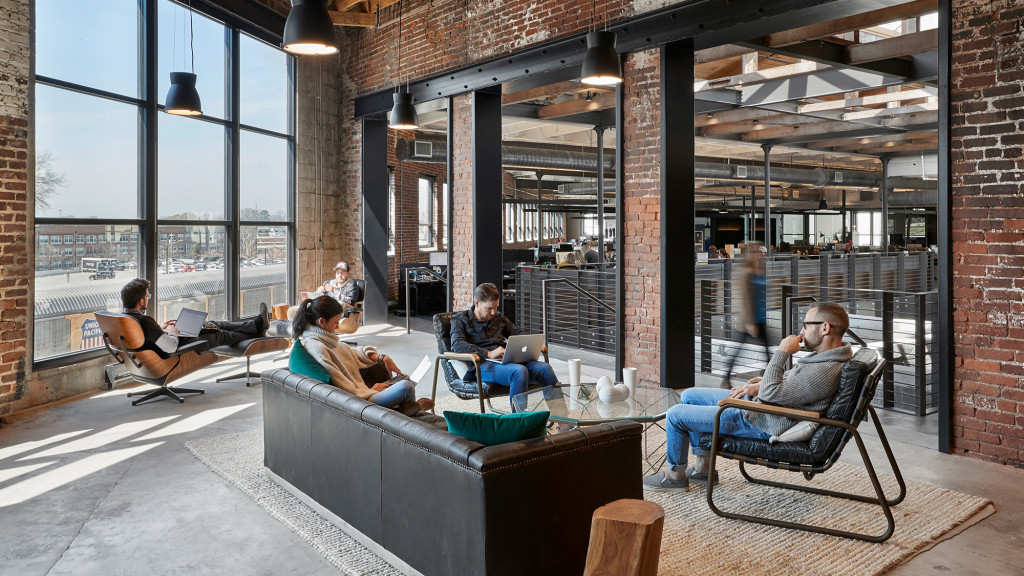A group of people sitting in chairs.