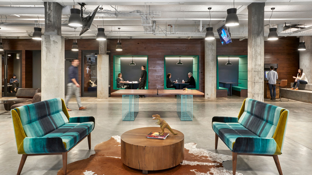 A large room with chairs and tables.