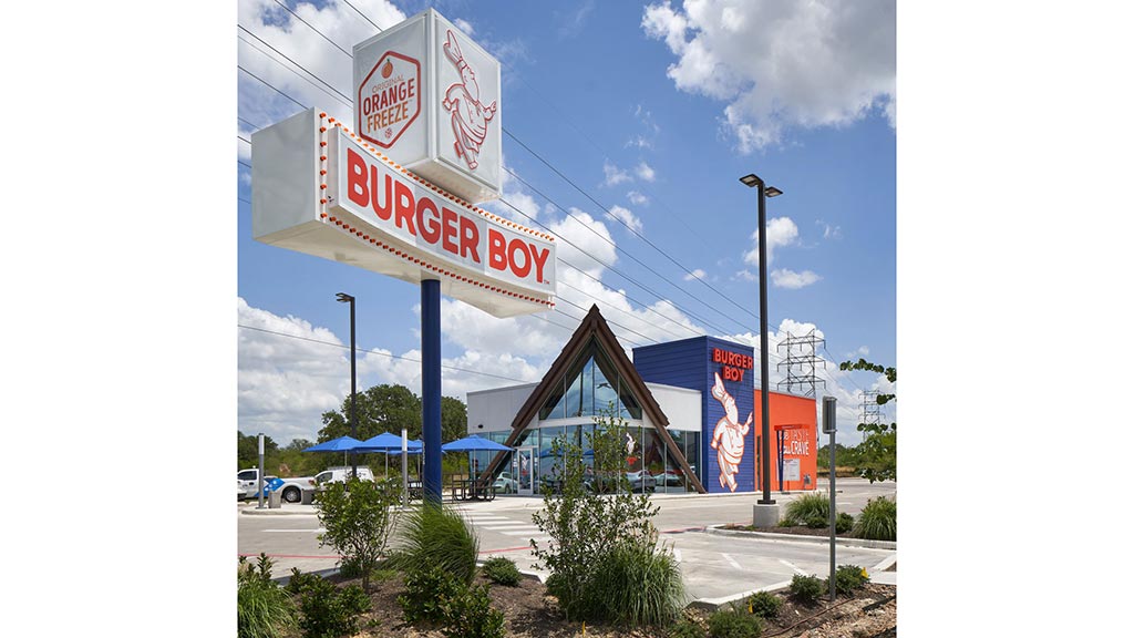 A sign in front of a building.