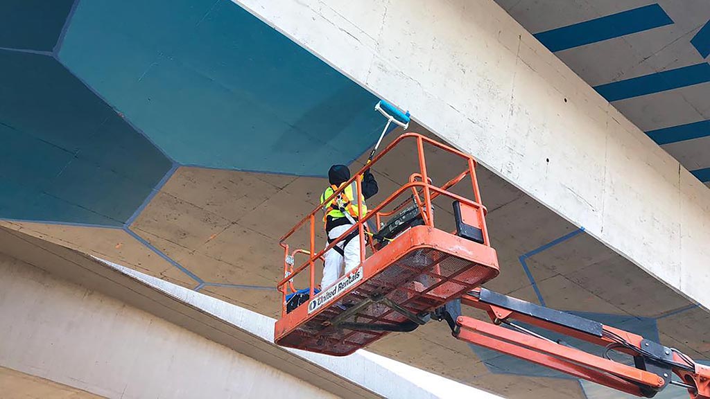 A few men on a ladder.