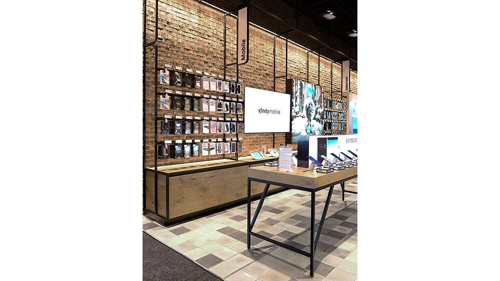 A room with a table and shelves.