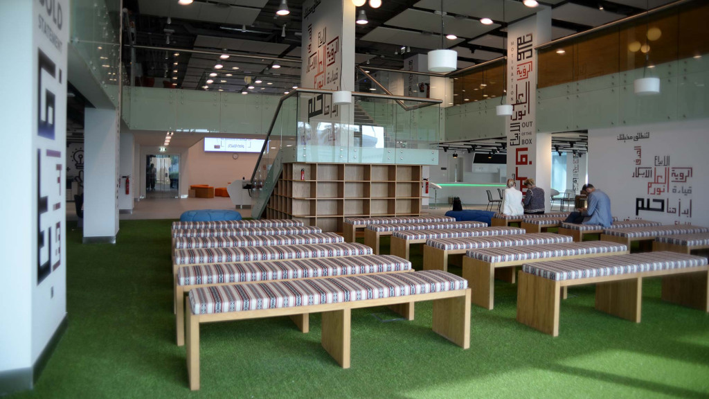 A room with tables and chairs.