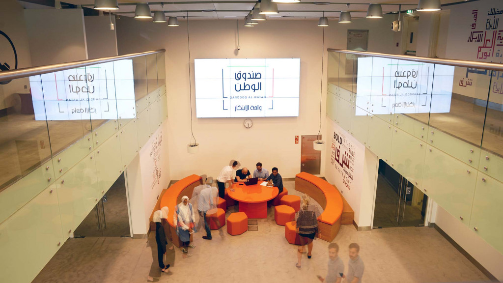 A group of people in a room.