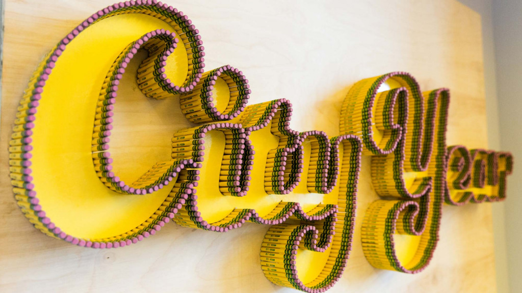 A snake with yellow and purple stripes.