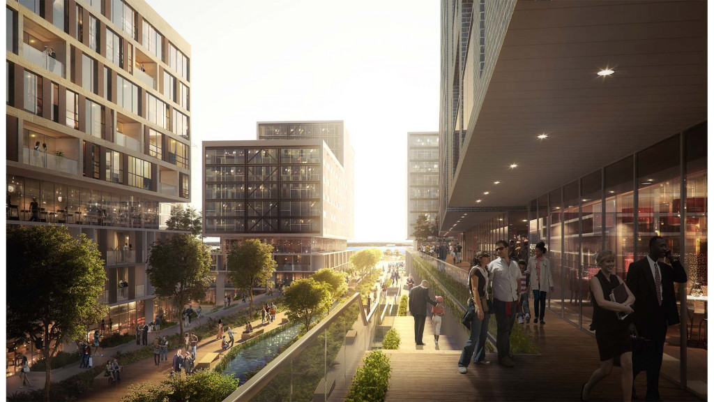 People walking on a walkway between buildings.