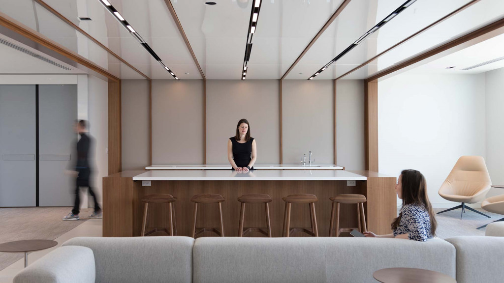 A person standing at a table.