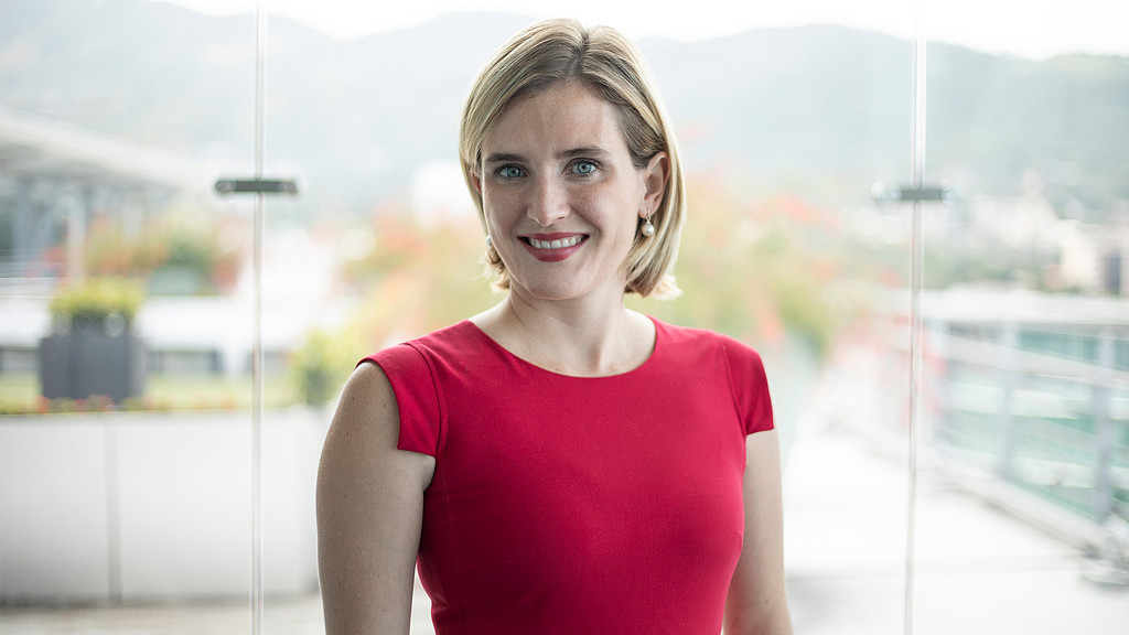 A person in a red dress.