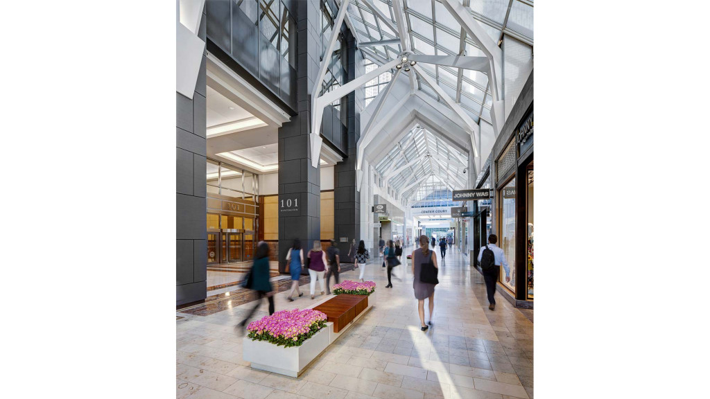 People walking in a large building.