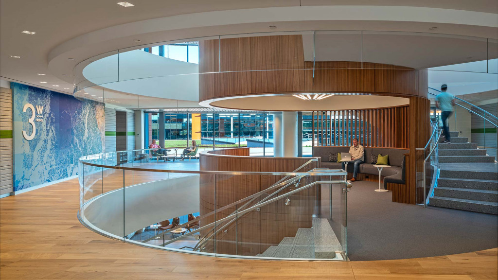 A large room with a glass floor and a large glass wall.