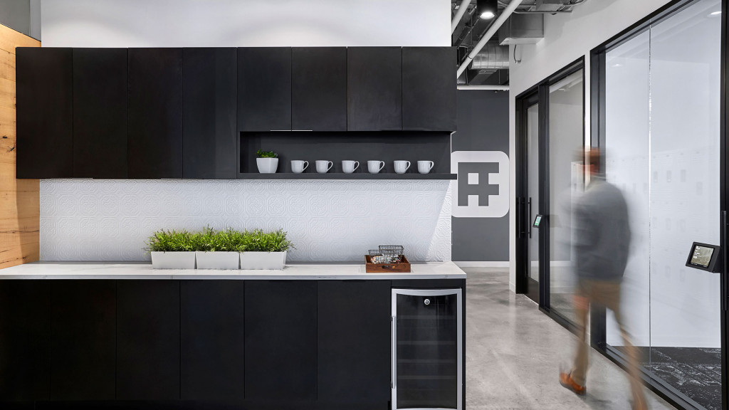 A person walking in a room.