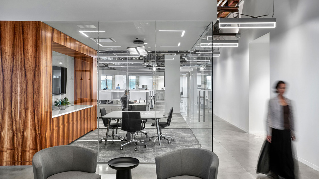 A person walking in a large room.