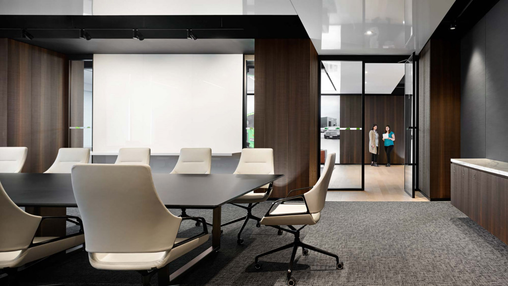 A room with a table and chairs.