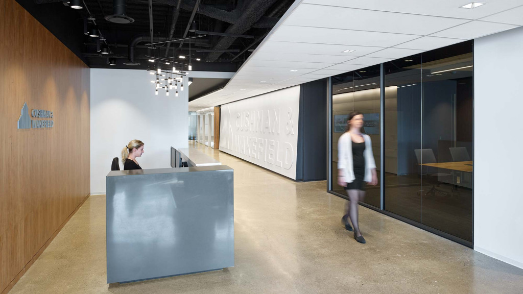 A man walking in a hallway.