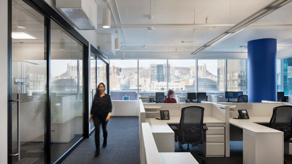 A woman and a man in an office.