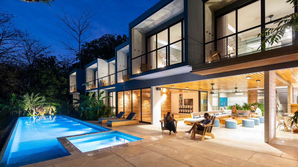 A house with a pool and a deck.