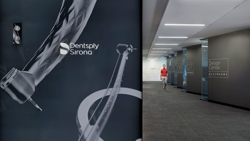 A person walking in a hallway.