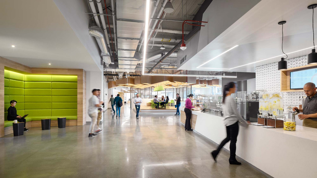 People walking in a large building.