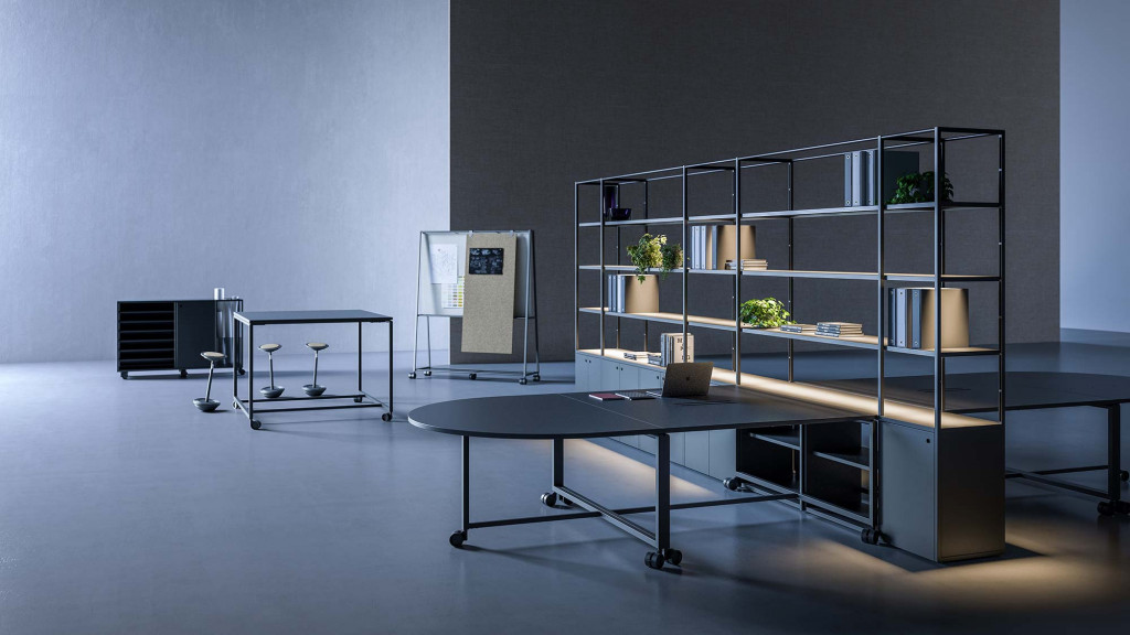 A room with a table and shelves.