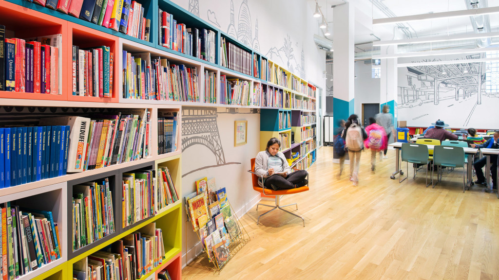A person sitting in a library.