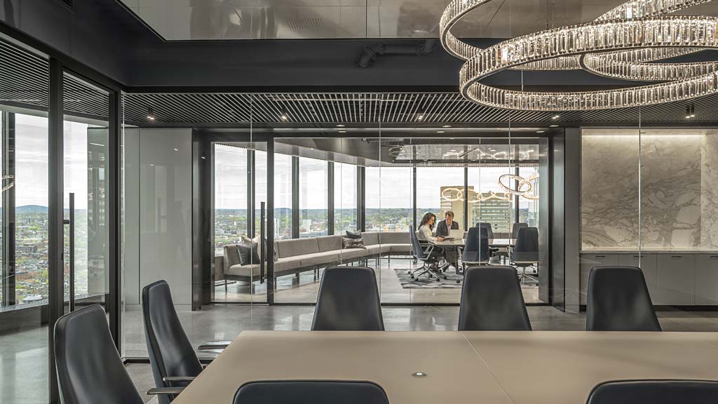 A room with a table and chairs.