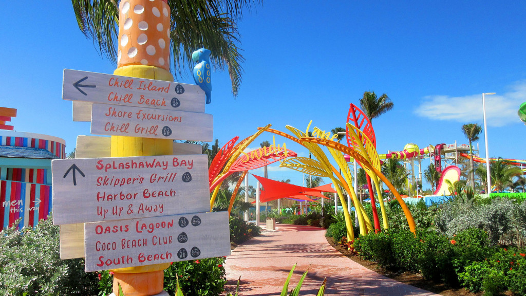 A sign with a tropical theme park.