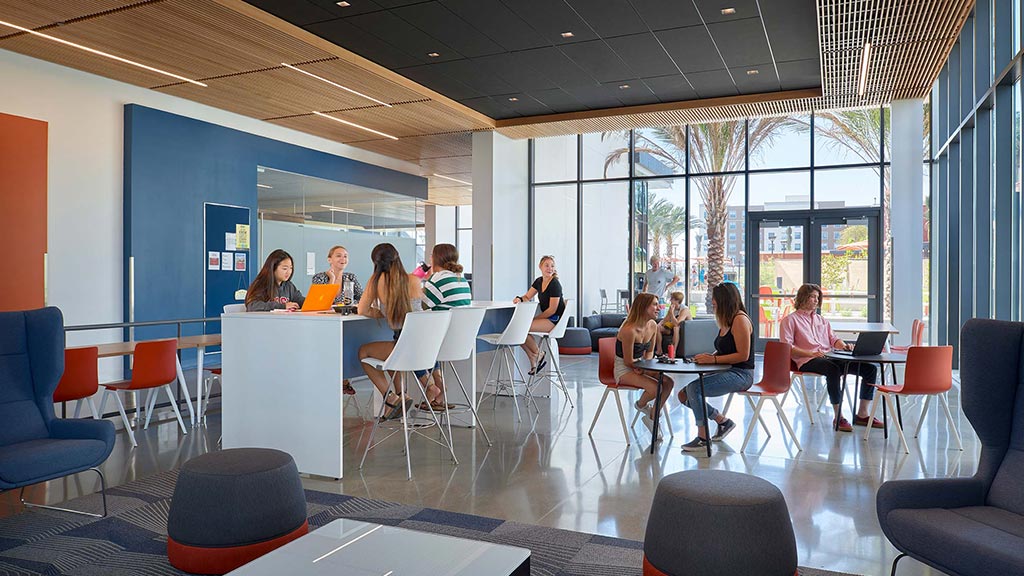 A group of people sitting around a table.