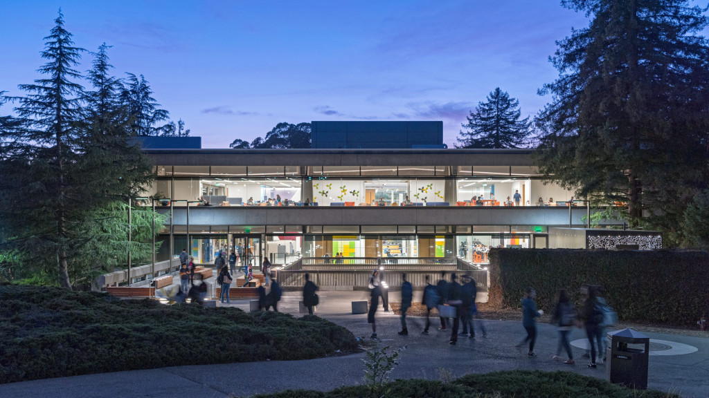 A building with a large glass front.