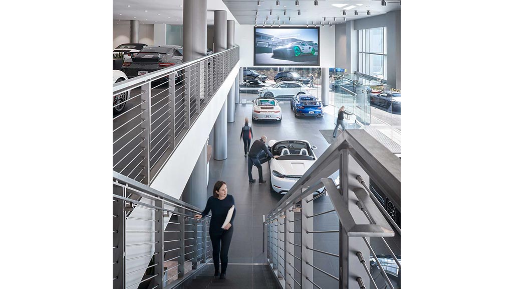 A person standing on a balcony.