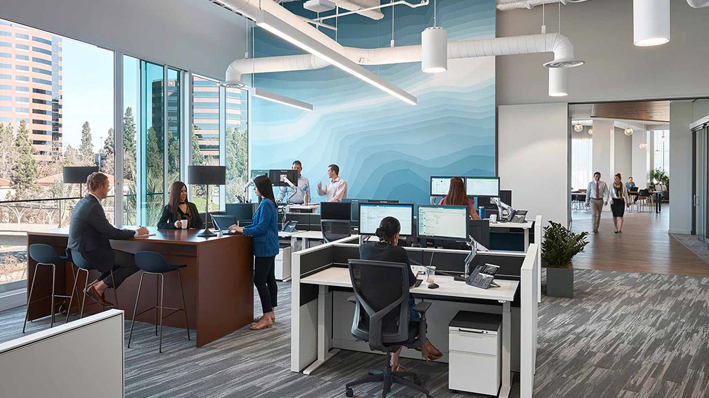 A group of people in an office.