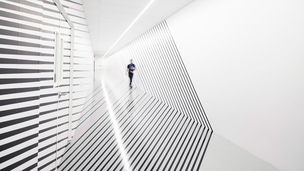 A person walking up a staircase.