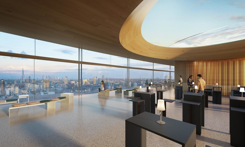 A room with a large window and a view of a city.